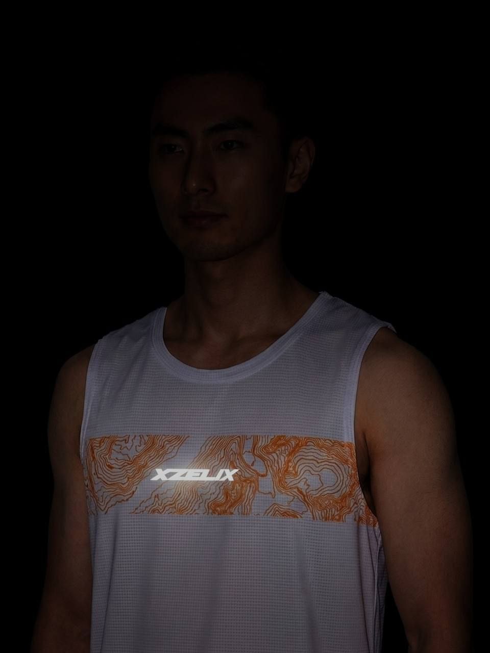 เสื้อวิ่งขนกุด Xzelix Xpand Your Limits Tank Top Unisex